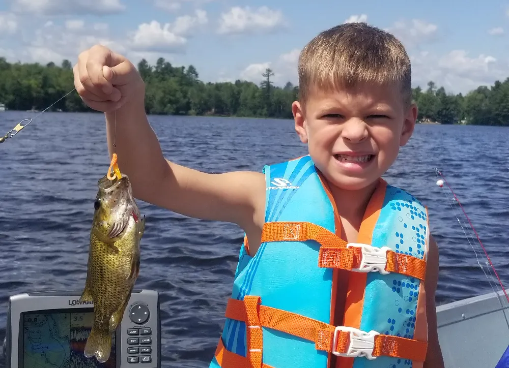 kid catching fish